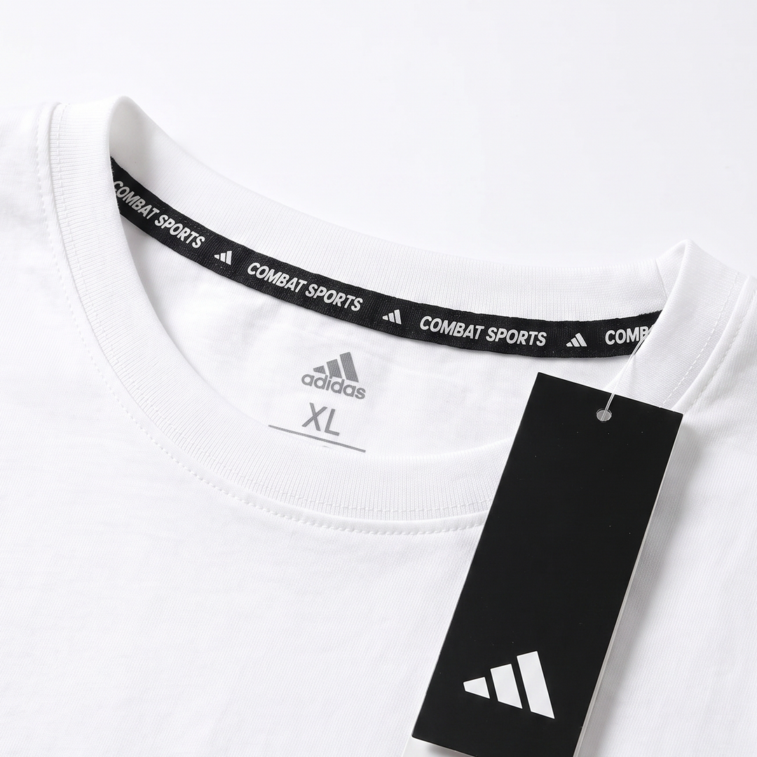 CAMISETA DEPORTIVA- ADIDAS - COMBAT SPORTS - ADITSG2V2T - ALGODÓN