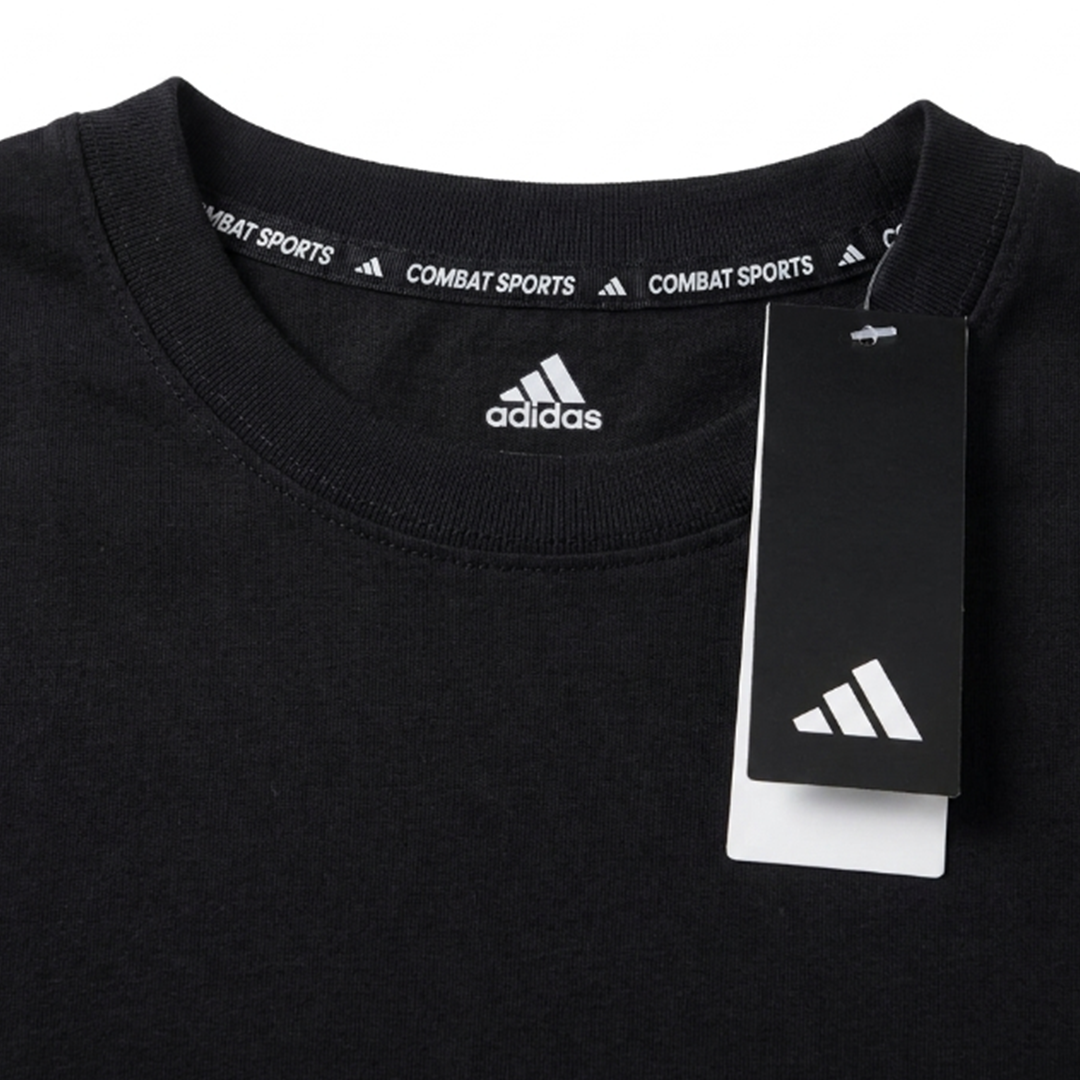 CAMISETA DEPORTIVA- ADIDAS - COMBAT SPORTS - ADITSG2V2T - ALGODÓN